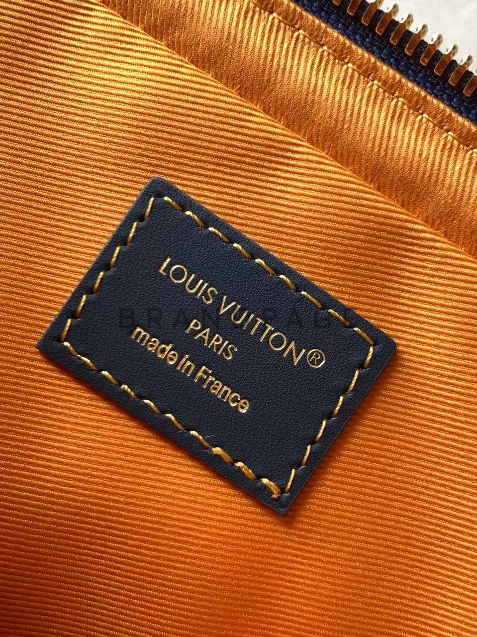 Клатч из вощенной канвы Louis Vuitton BPLUX13193