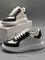 Кеды бело-чёрные от Alexander McQueen Oversized Retro Sneaker BP5-034389 — фото 2 [TG 0a09e2bb24e1-002]