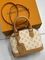 Сумка бежевая с розовым узором и рыже-коричневой отделкой от Louis Vuitton Alma BB BP5-879557 — фото 6 [TG 768707caace8-006]