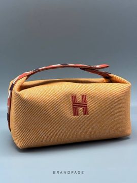 Косметичка золотисто-жёлтая от Hermès BP5-649658