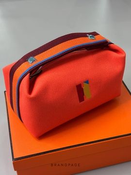Косметичка красно-оранжевая с разноцветной лентой от Hermès BP5-425434